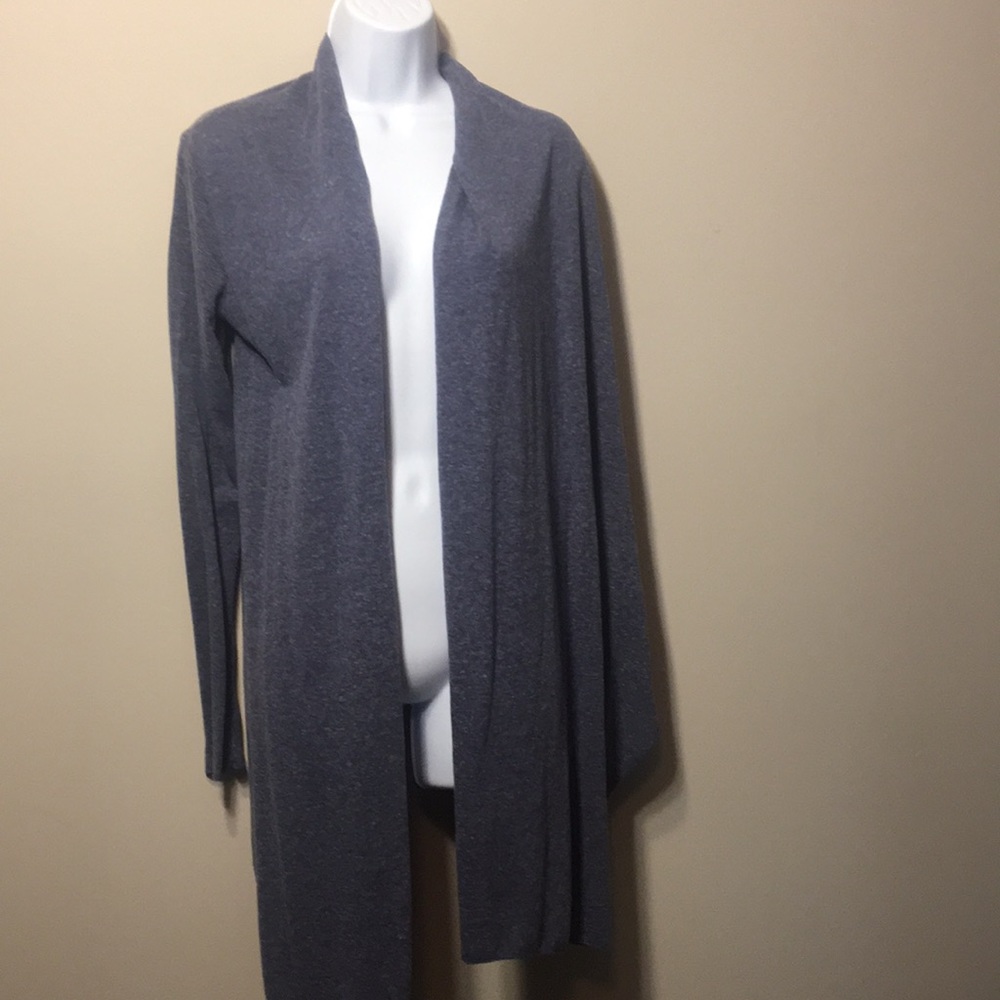 Worn, but good condition. Blue striped cardigan.